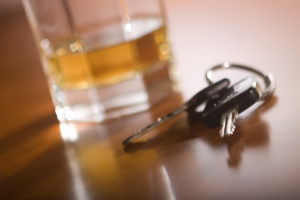 Car key and a Liquor