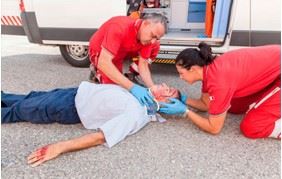 Injured man with rescue team