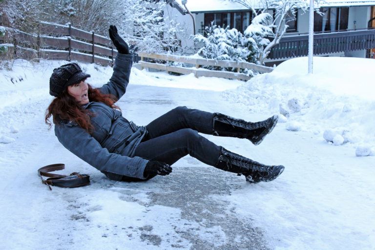 woman slip in the snow